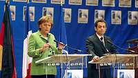 Merkel und Sarkozy beim NATO-Gipfel in Bukarest, April 2008