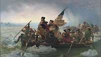 Soldaten rudern ein volles Boot fährt über einen aufgewühlten Fluss, George Washington steht im Bug.